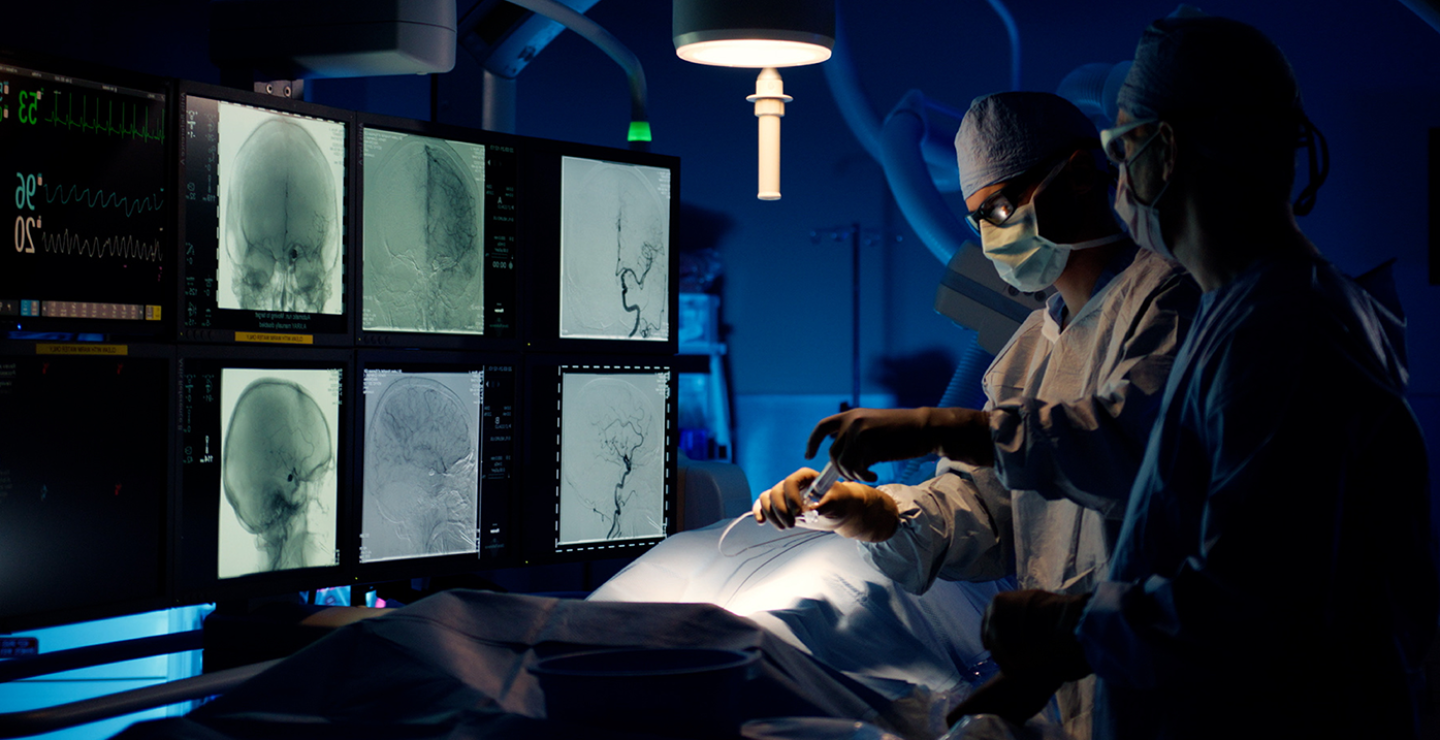 A surgeon working in the operating room