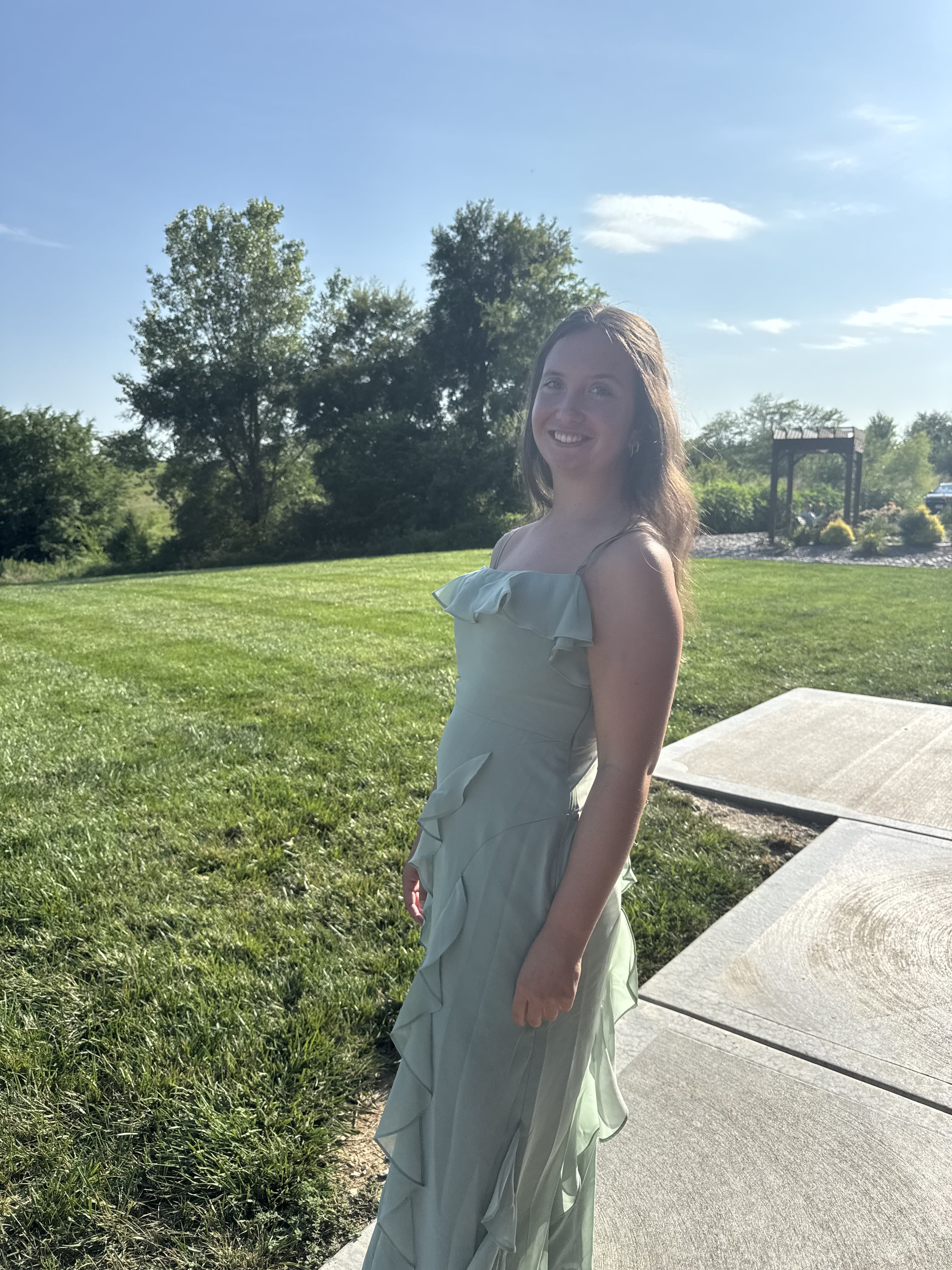 Cali in a green dress. 