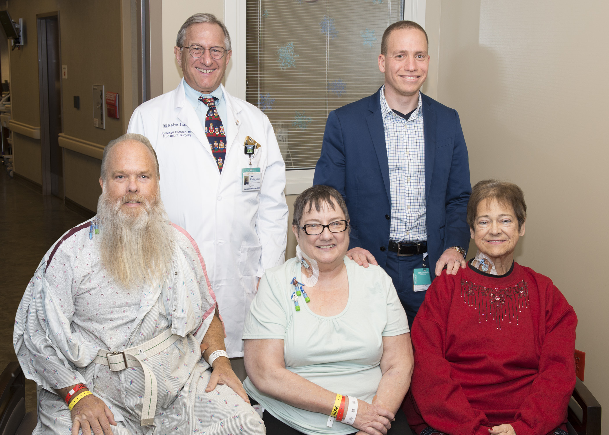 Three kidney transplant recipients and the two physicians who did the surgeries