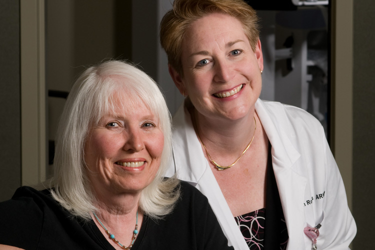 Two ladies, smiling