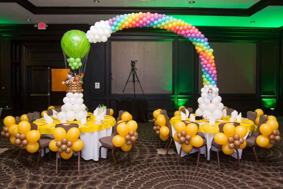 Tables decorated as the Wizard Of Oz's song Somewhere Over the Rainbow