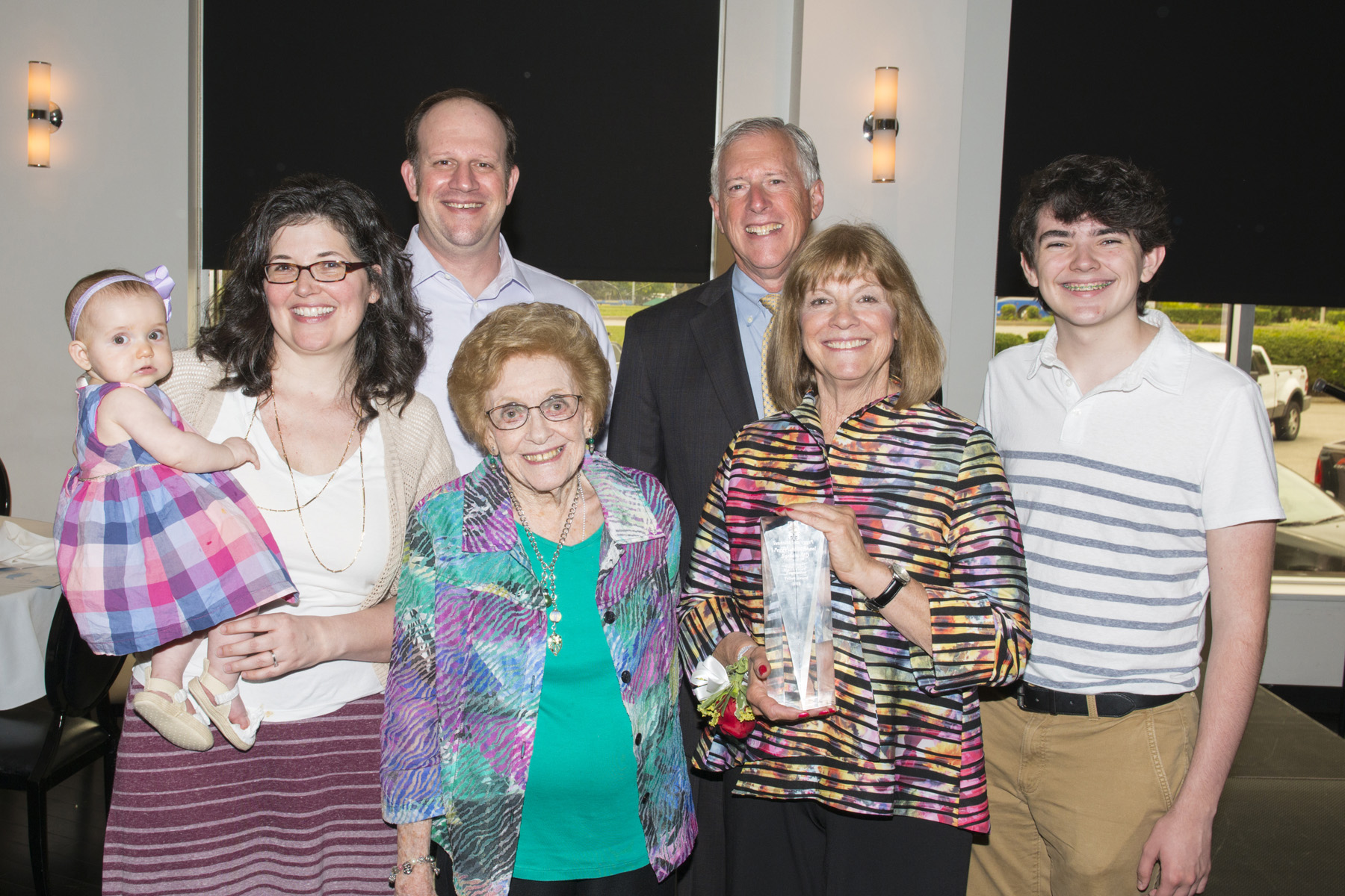 Michael and Peggy Borkon pose with family after accepting the 2018 Foundation Fellow Award