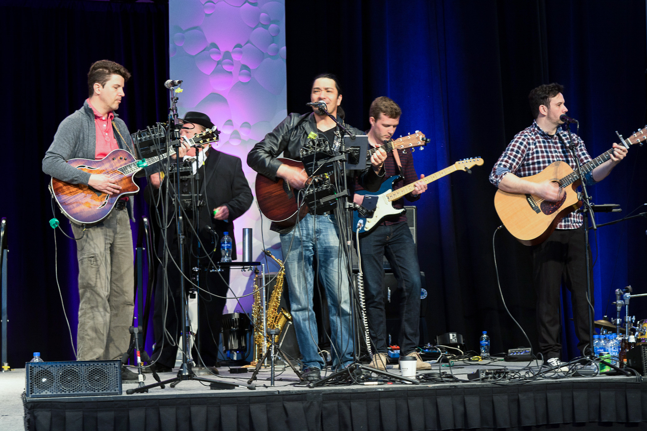The band on stage playing at the 2018 Books and Boutique 