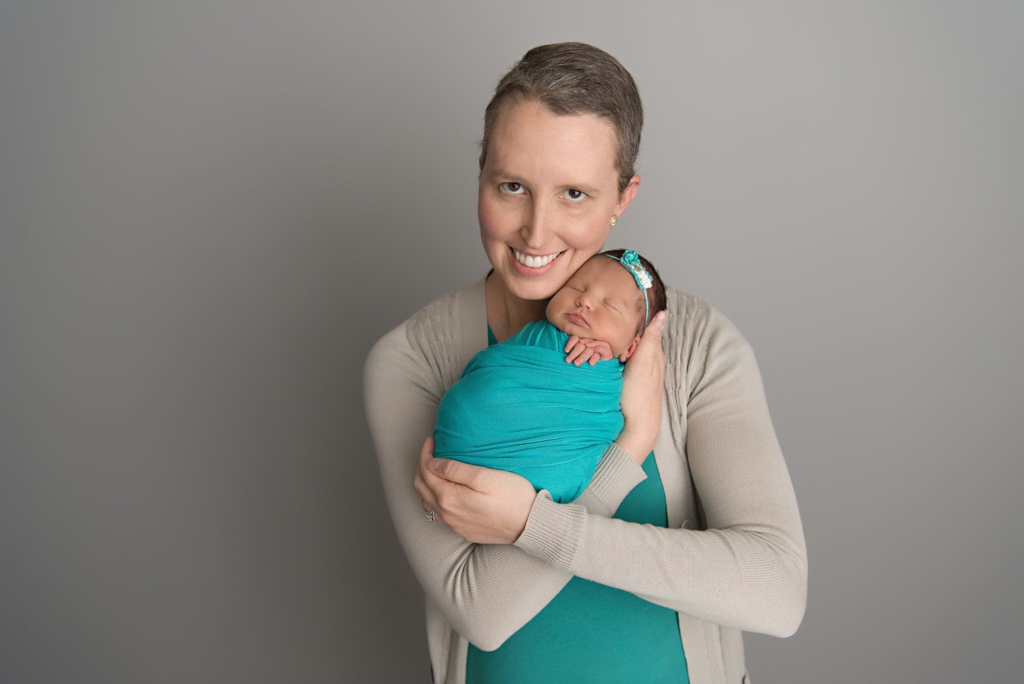 Laura Grable holding her baby