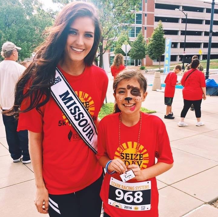 Erica Stone with a young girl at the 5k for seize the day