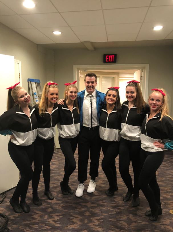 KMBC's Cody Holyoke with volunteers at Boo Ball