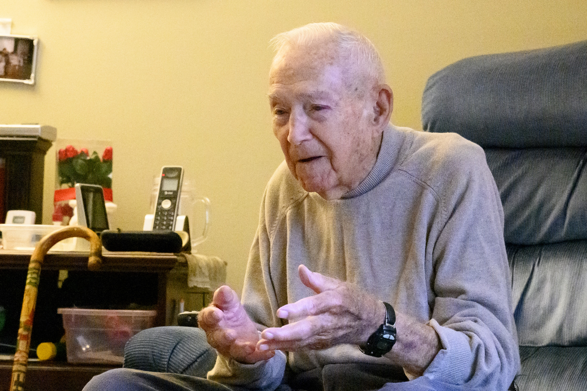 Dale Cooksey talking in his living room