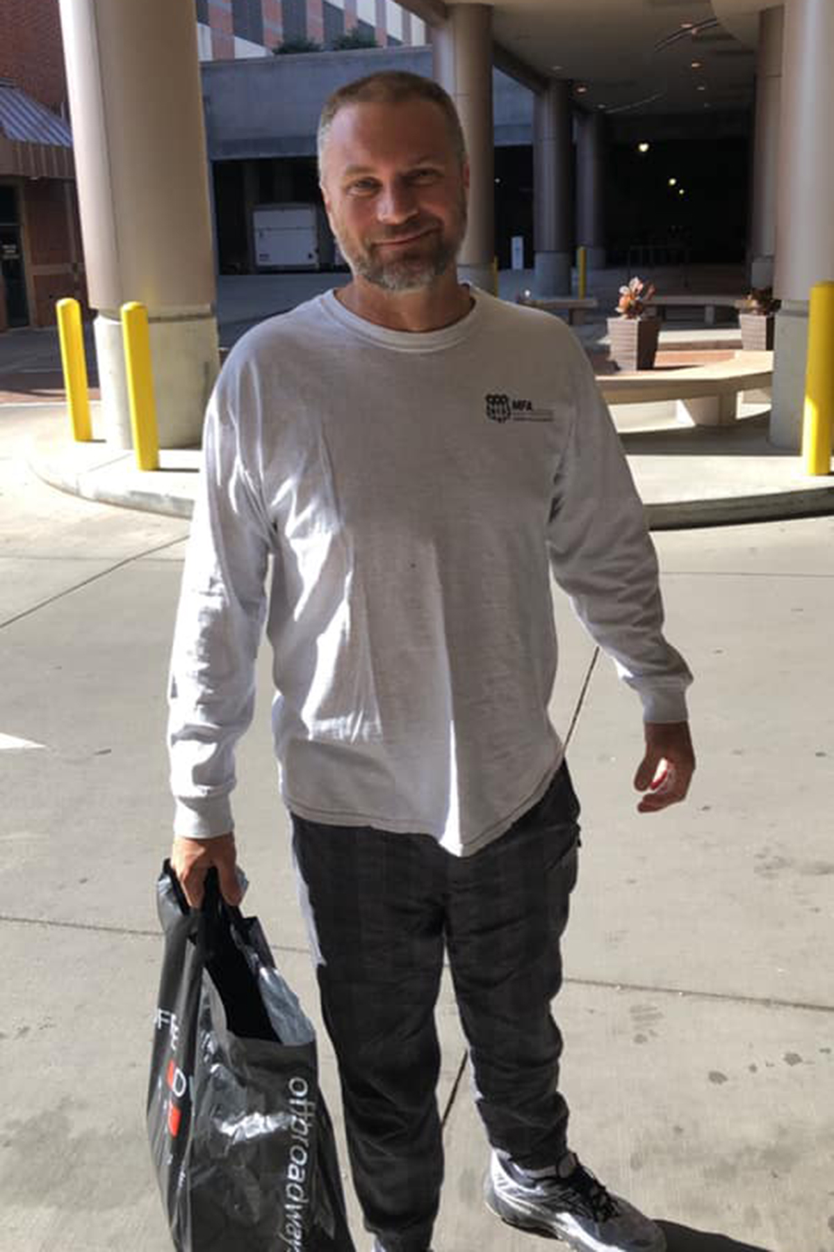 Dustin Cox leaving the hospital