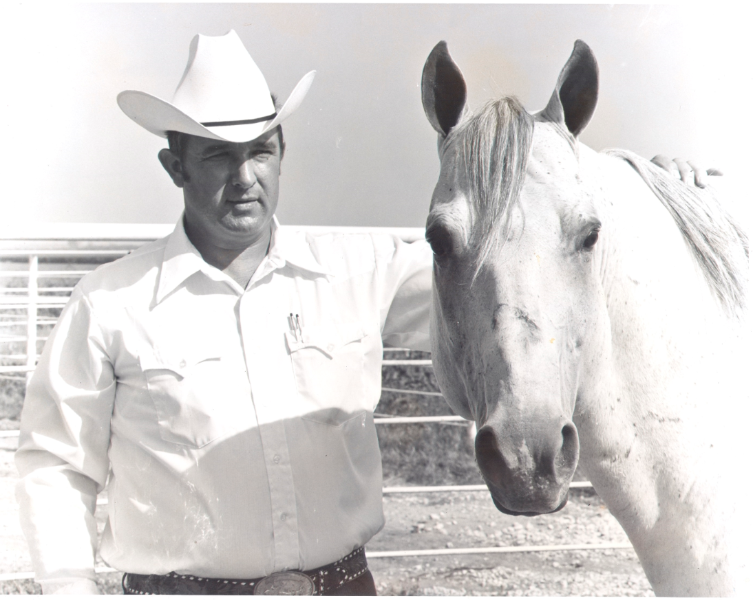 Duane and his horse, Jackie Bee, in a black and white photo