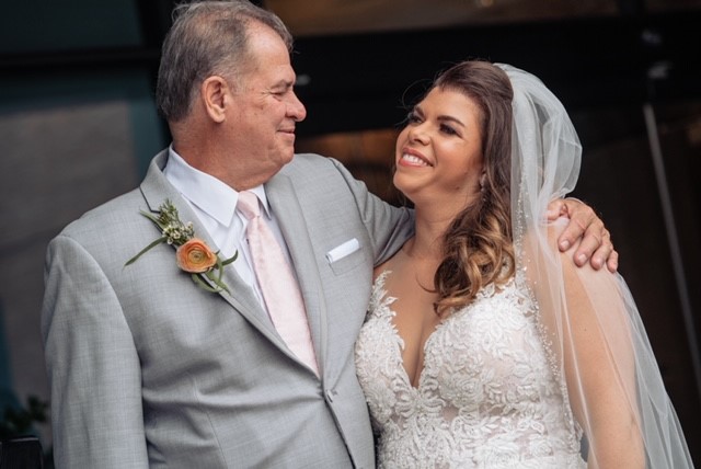 Henry Myers with his daughter on her wedding day