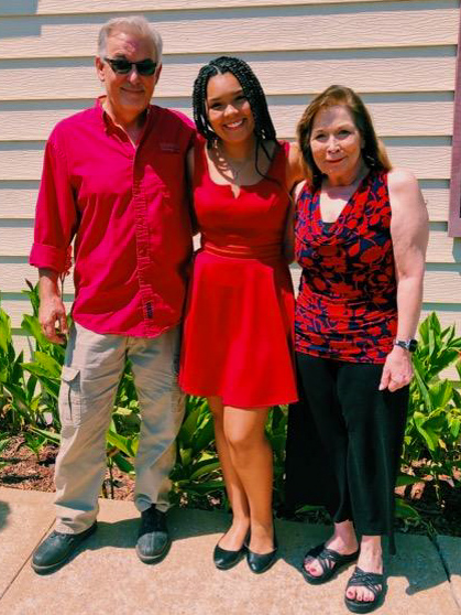 Rhonda Zacharias with her husband and granddaughter