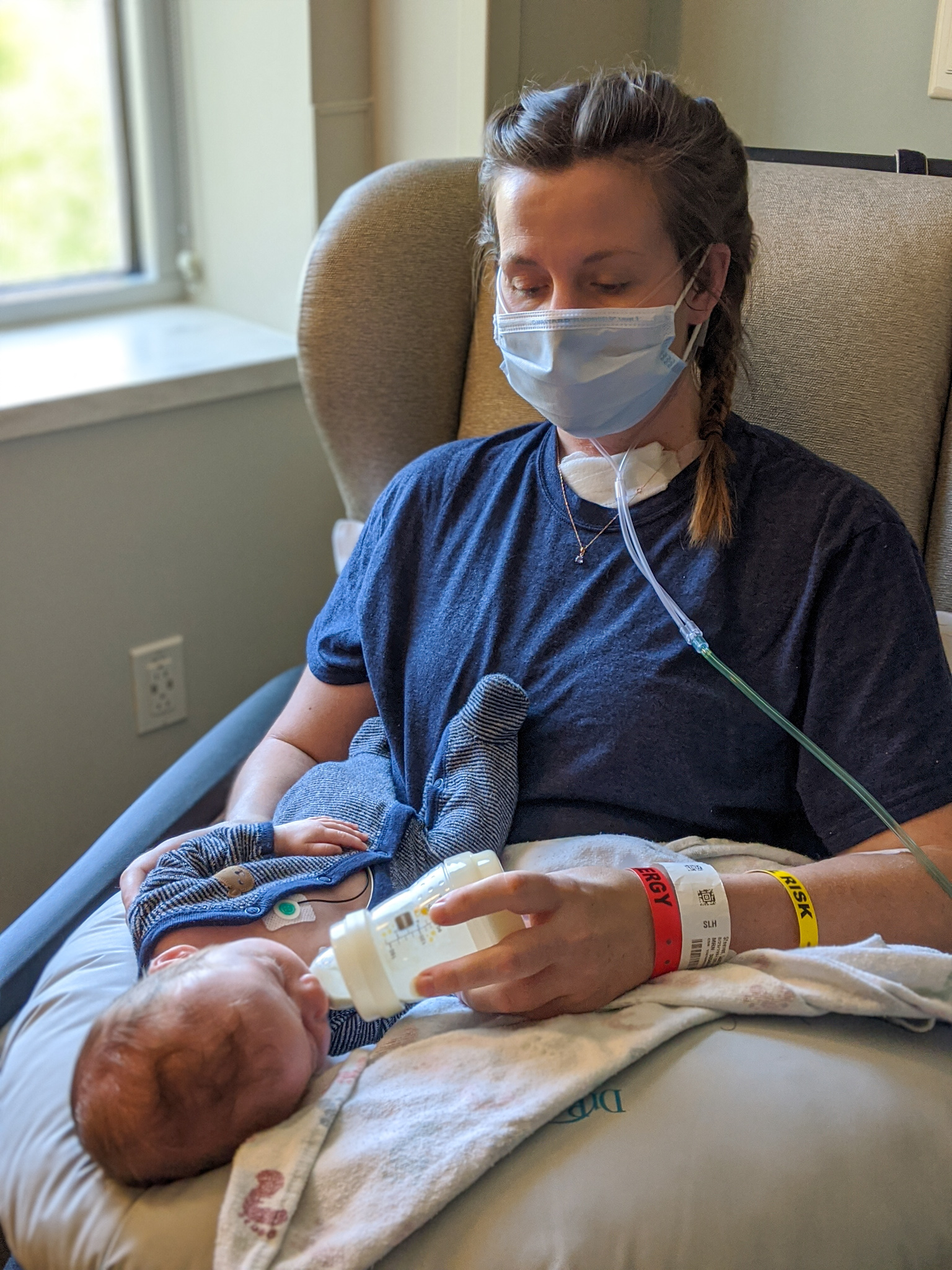 Laura Steeves bottle feeding her baby after being taken off ventilator