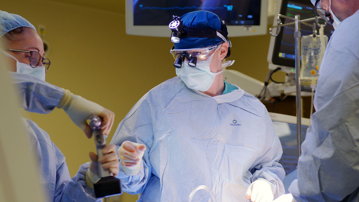 Jessica K. Heimes, MD, surgical director of heart transplant, performs one of nearly 1,000 heart transplants.