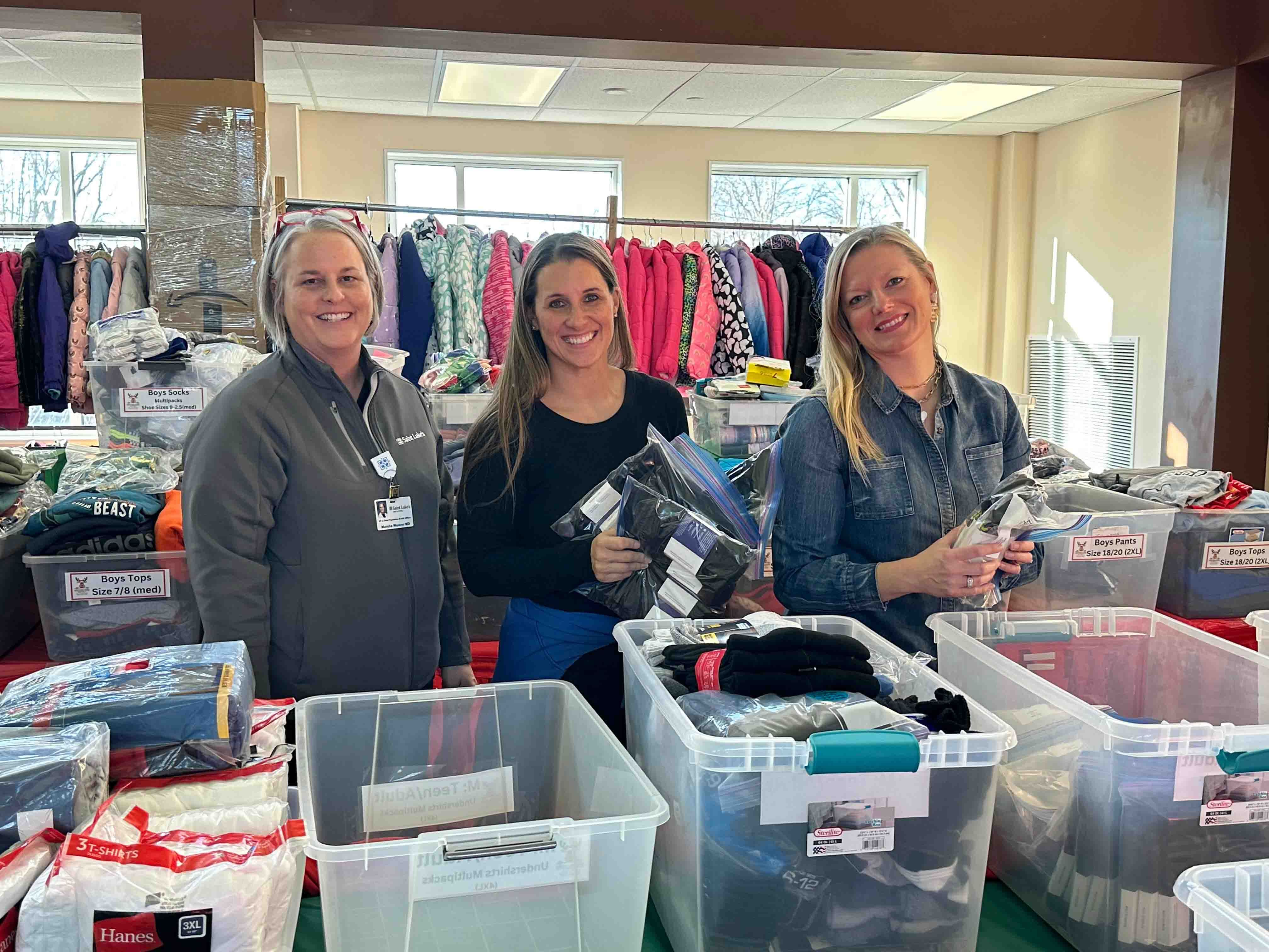 Saint Luke’s Population Health Team members volunteer during the holiday season at our community partners, including Metro Lutheran Ministries Christmas Store.
