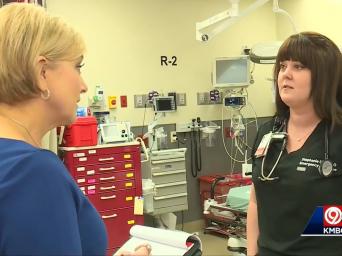 KMBC 9 abc. Kelly Eckerman interviewing Dr. Stephanie Davis about the flu.