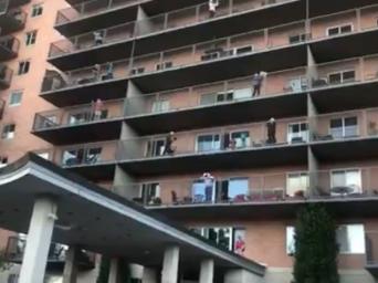 KC residents take to balconies to applaud health care workers