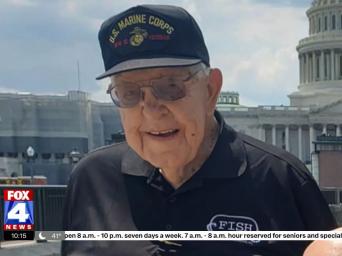 FOX4 News. Local WWII Veteran Max Deweese in front of the Capitol
