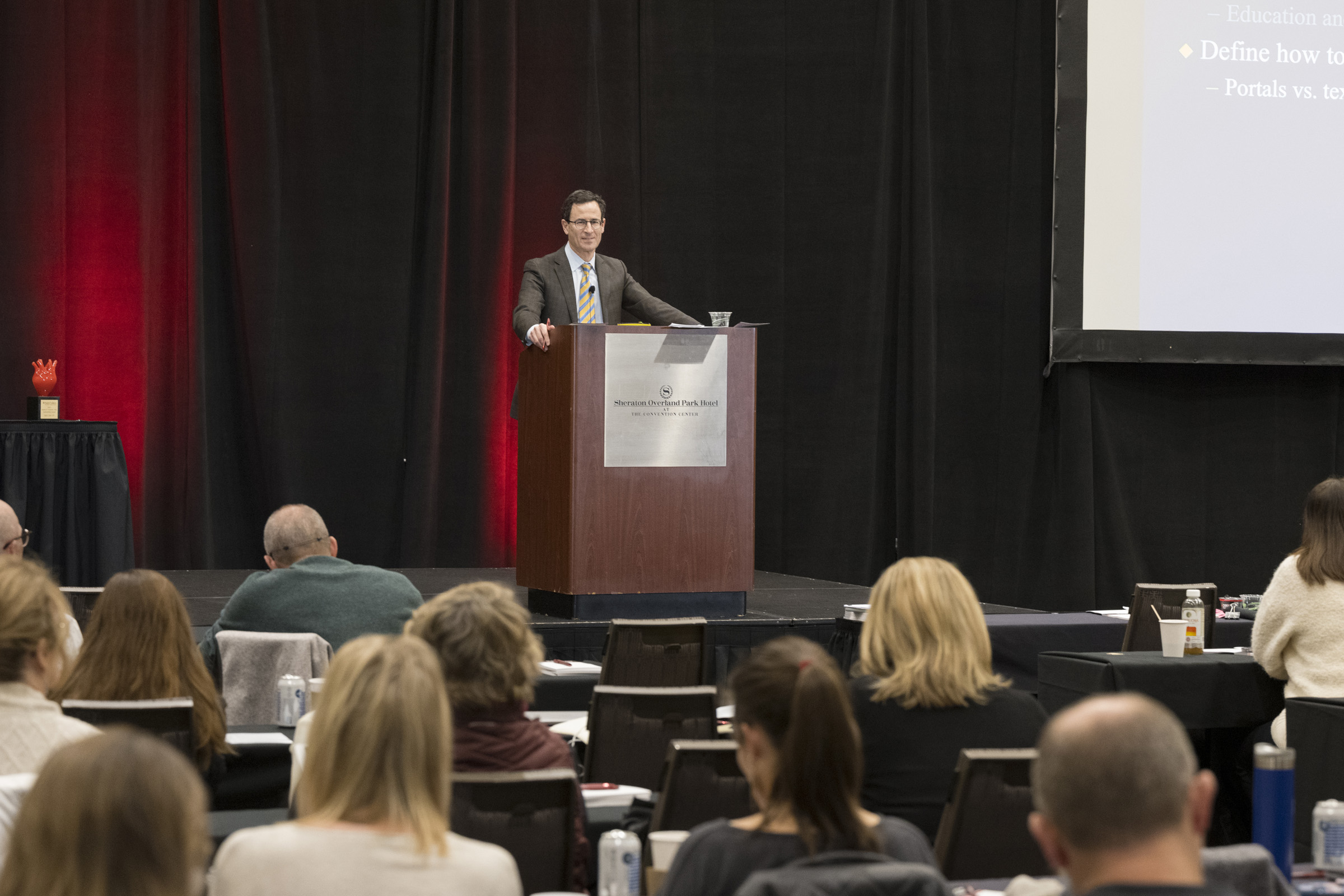 A speaker at a Saint Luke's education conference