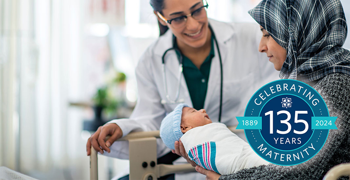 Mother and newborn with health care worker