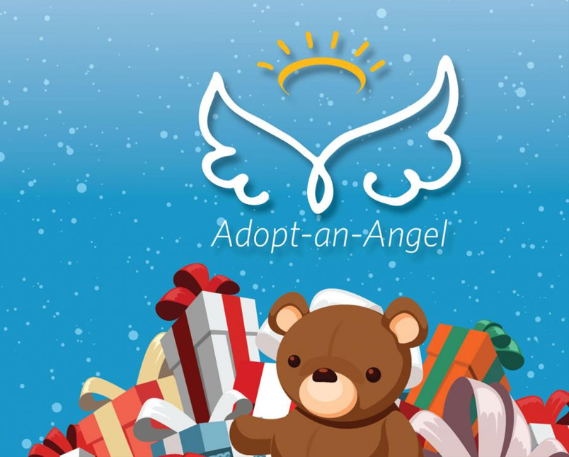 Adopt-an-Angel teddy bear with gifts