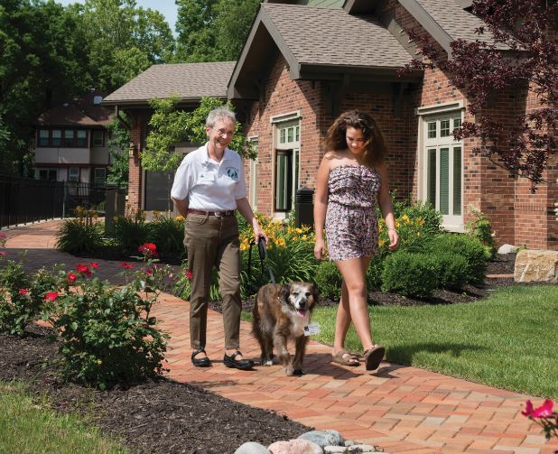 Molly, DOC, being walked at Hospice House