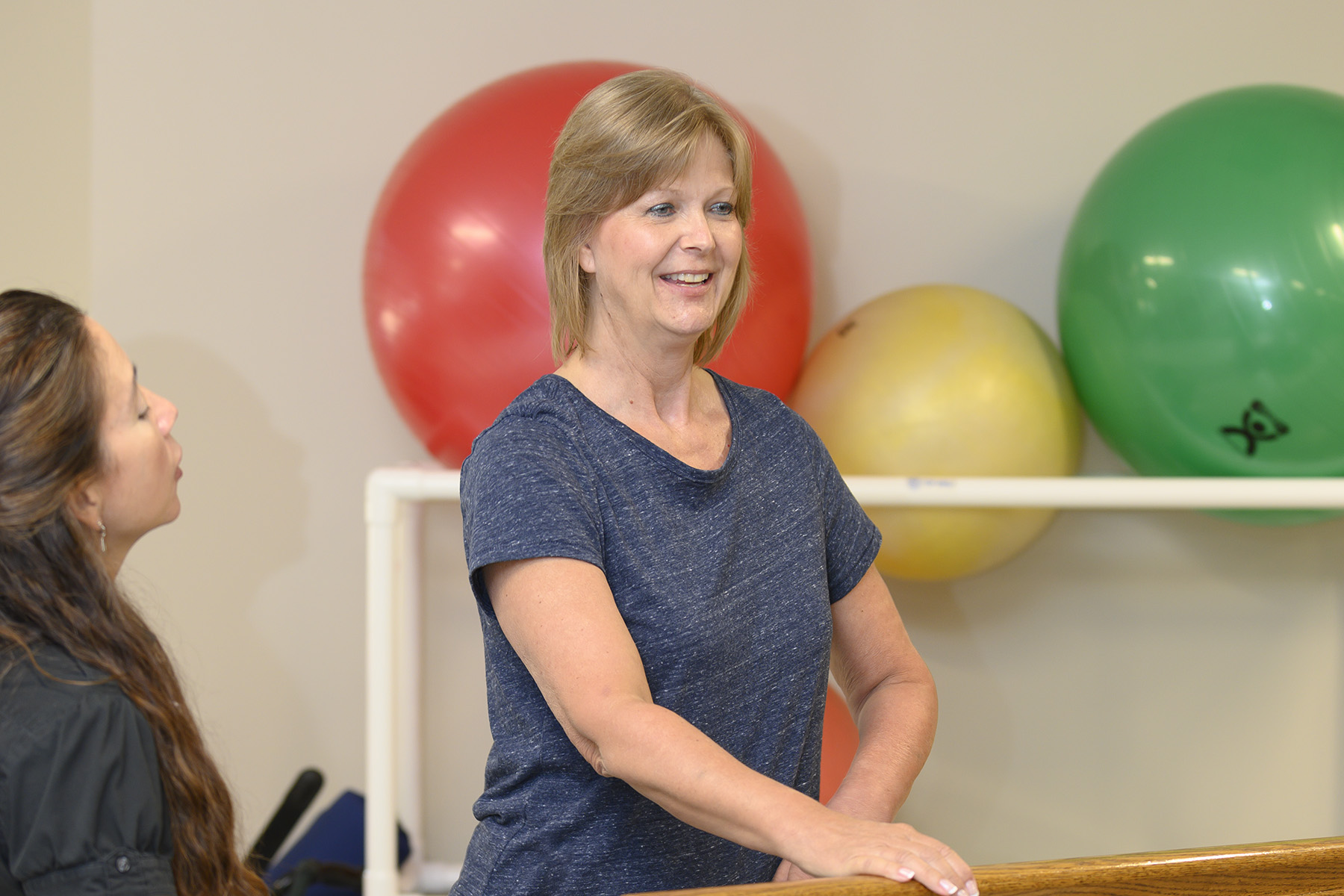 Susan Rushing working with her physical therapist
