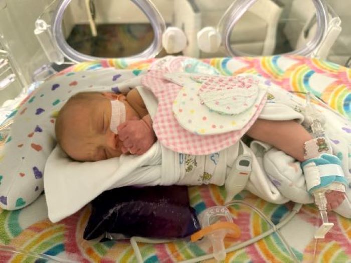 Baby Averie in a hospital bed in the NICU.