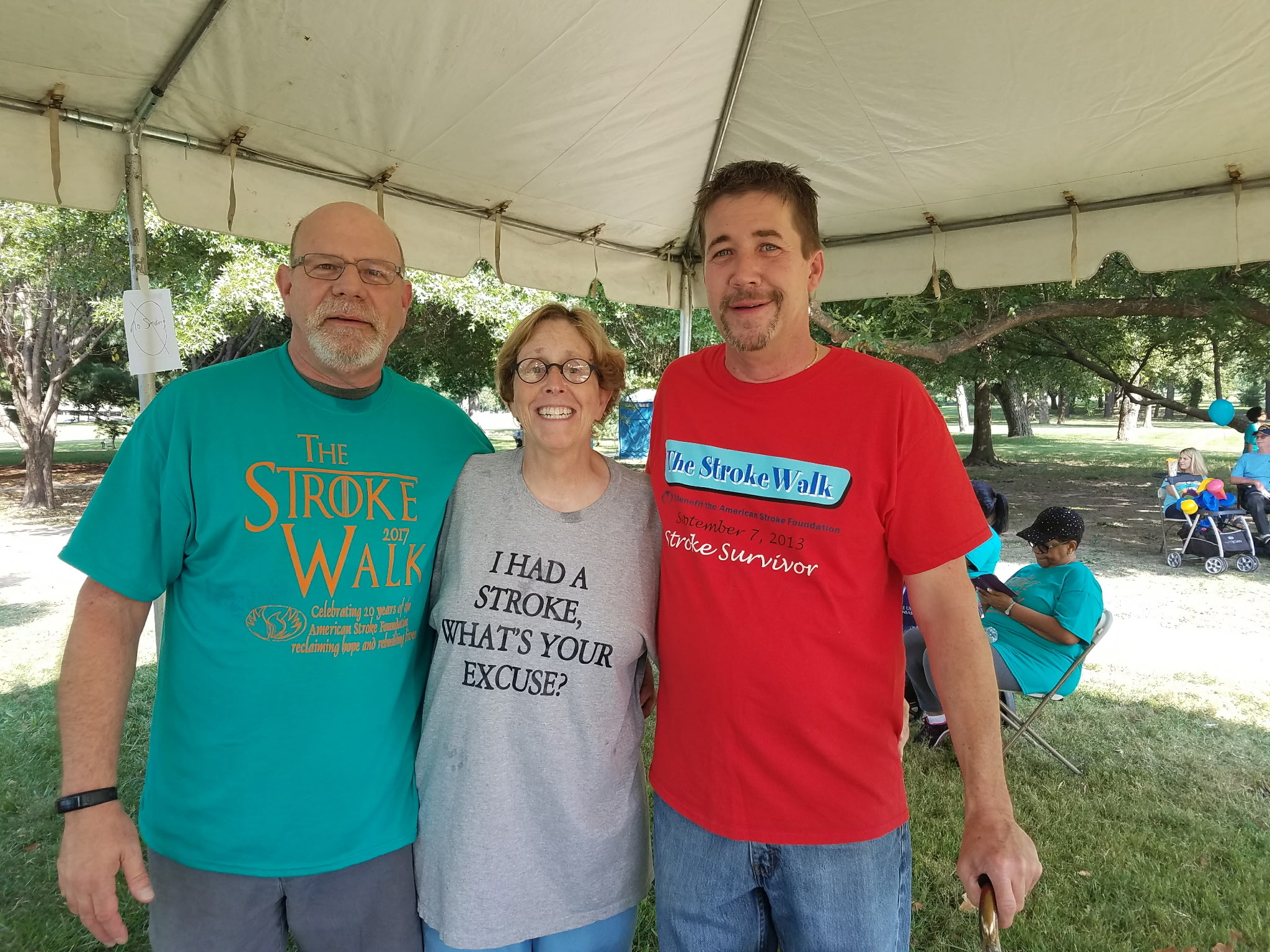Don posing with Bob and one woman in the middle for the Stroke Walk