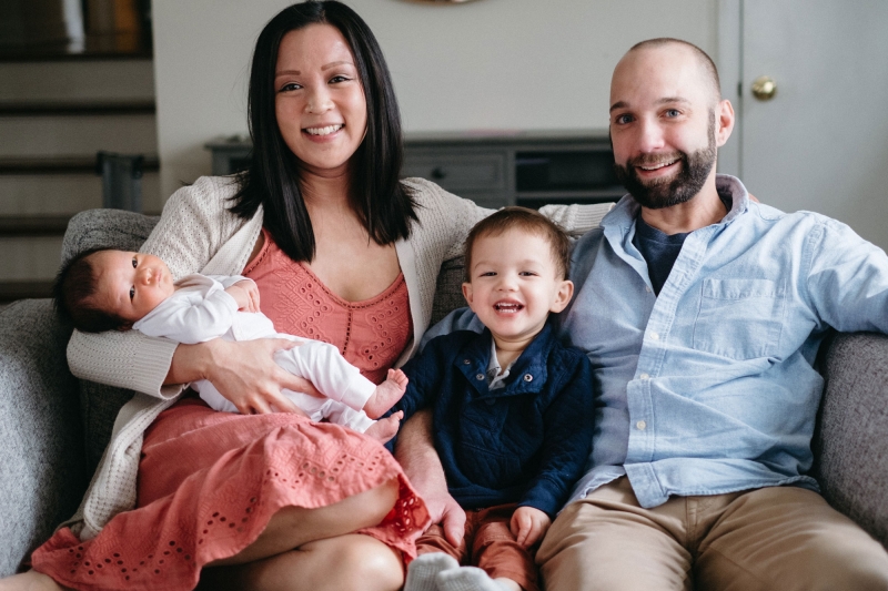 Isabel Hodes, a SCAD survivor and Saint Luke's patient, is smiling with her family.