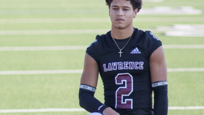 Jaylen on a football field. 