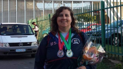 Barb Sheble with transplant games medals